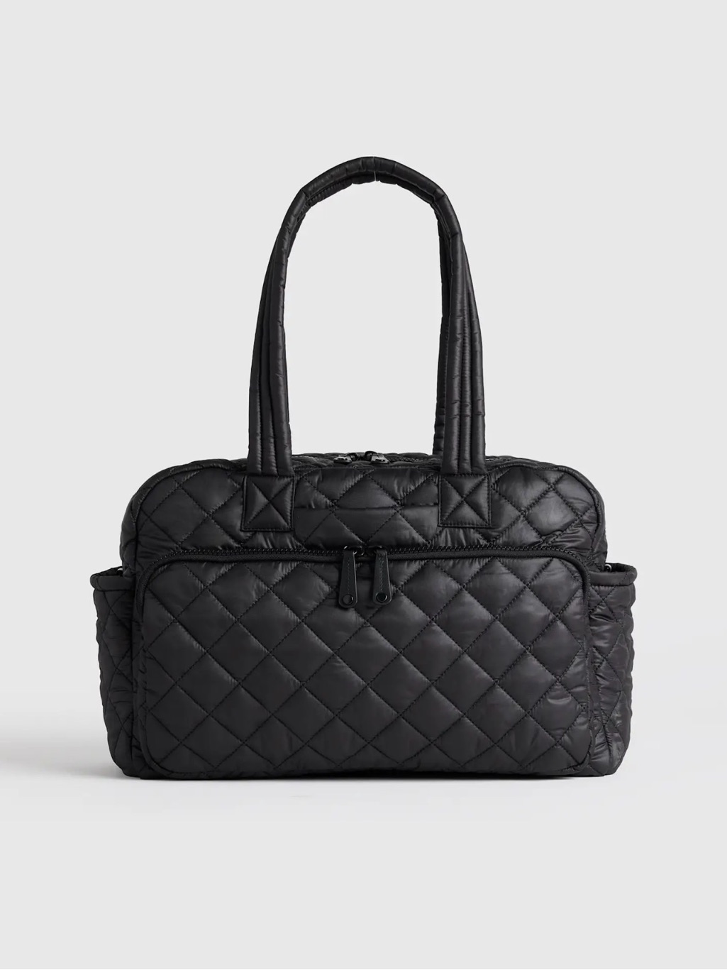 Quince Transit Quilted Duffle Bag In Black 886